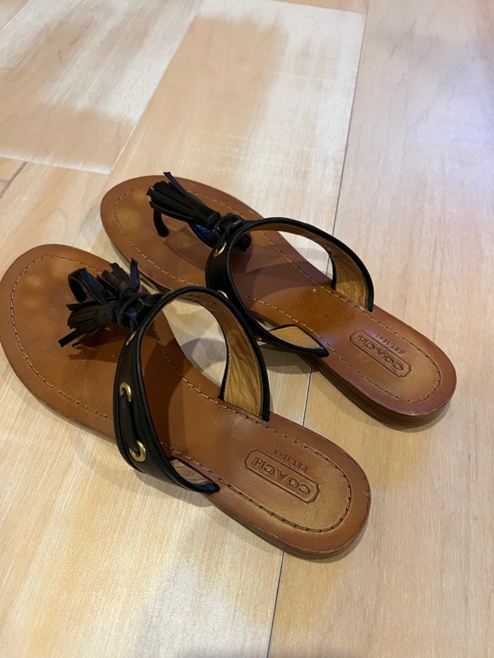 Coach Black Leather Tassel Thong Sandals with Brown Footbed